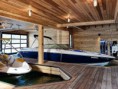 /album/galeria/floating-wooden-one-bedroom-cabin-with-integrated-boathouse-10-boathouse-thumb-630xauto-33606-jpg/